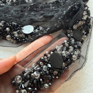 monochromatic black on black beaded ribbon for avant garde couture